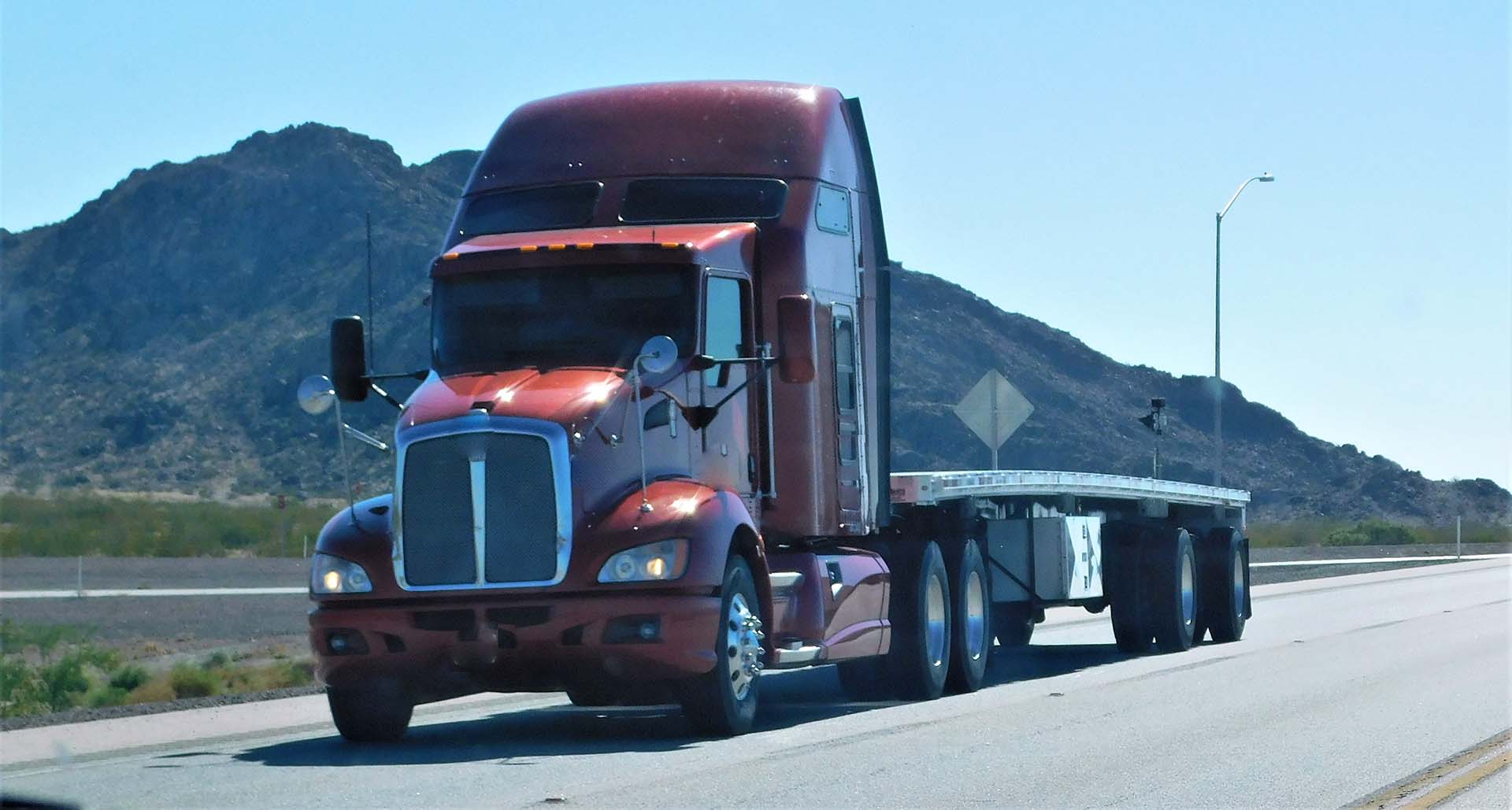trucking-no-load-flat-bed-trailer
